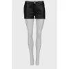 Black leather shorts