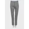 Trousers with arrows in fine print