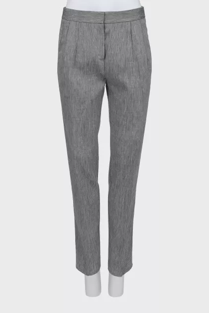 Trousers with arrows in fine print