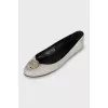 Leather ballet shoes decorated with a skull