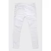 Skinny jeans decorated with laces