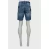 Men's denim shorts with distressed effect