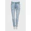 Light blue distressed skinny jeans