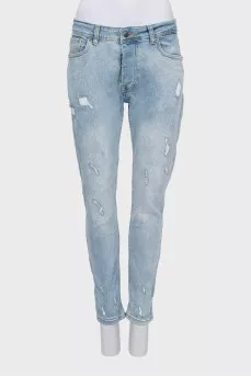 Light blue distressed skinny jeans