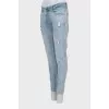 Light blue distressed skinny jeans