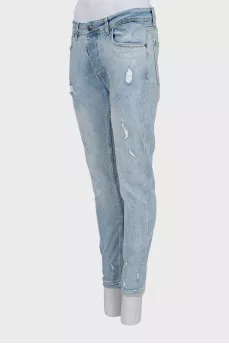 Light blue distressed skinny jeans