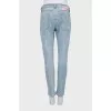Light blue distressed skinny jeans