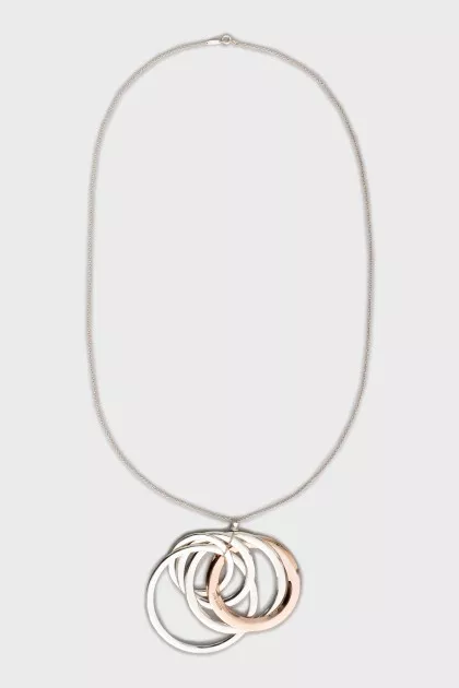 Silver pendant with five rings