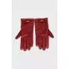 Red gloves with tag