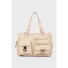 Leather tote bag with patch pockets