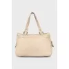 Leather tote bag with patch pockets