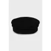 Wool cap with golden decoration