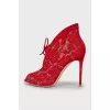 Red shoes with floral embroidery