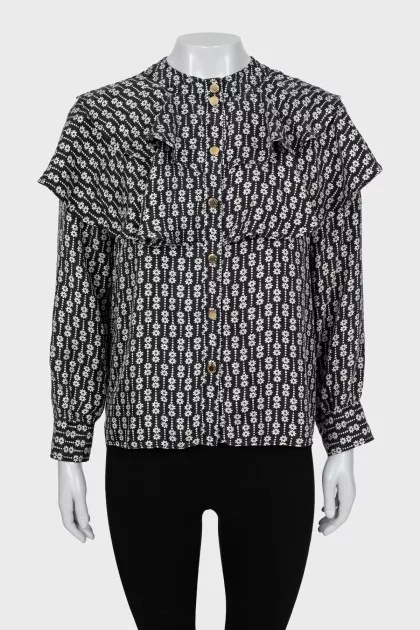 Black and white printed blouse with ruffles