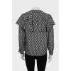Black and white printed blouse with ruffles