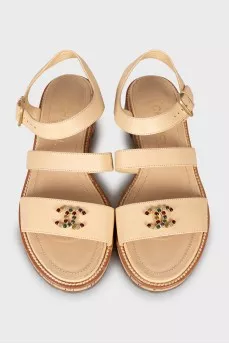 Leather sandals with gold logo