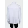 Loose fit shirt with ribbon