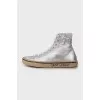 Silver leather sneakers with tag