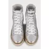Silver leather sneakers with tag