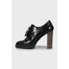 Leather ankle boots with wooden heels