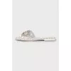 White flip flops with tag