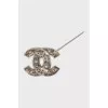 Logo brooch with rhinestones