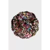 Textile brooch in the shape of a flower