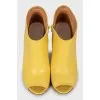 Yellow open toe ankle boots