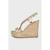Woven sandals with leather straps