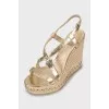 Woven sandals with leather straps