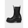Leather boots with rubber toe