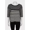Knitted sweater in a combined print