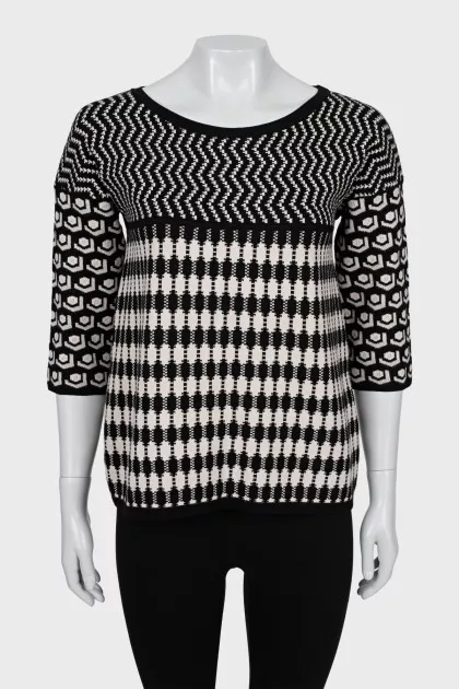 Knitted sweater in a combined print