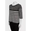 Knitted sweater in a combined print