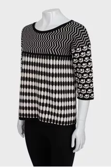 Knitted sweater in a combined print