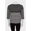 Knitted sweater in a combined print