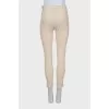 Beige high-waisted trousers