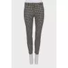 Black and white trousers with arrow print