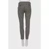 Black and white trousers with arrow print