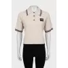 Knitted polo with short sleeves