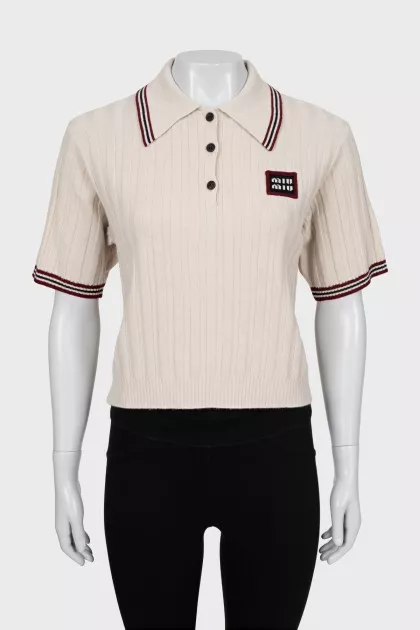 Knitted polo with short sleeves