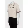 Knitted polo with short sleeves