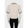 Knitted polo with short sleeves