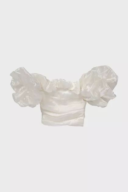 White blouse with puff sleeves and tag