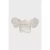 White blouse with puff sleeves and tag