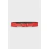 Red belt with gold buckle