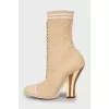 Textile ankle boots with shaped heels