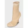 Textile ankle boots with shaped heels