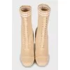 Textile ankle boots with shaped heels