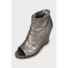 Silver peep-toe ankle boots